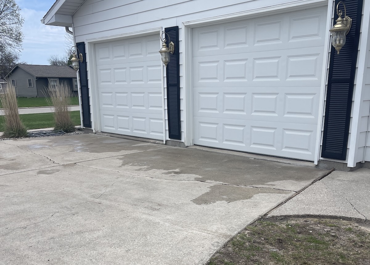 Driveway cracked sinking after