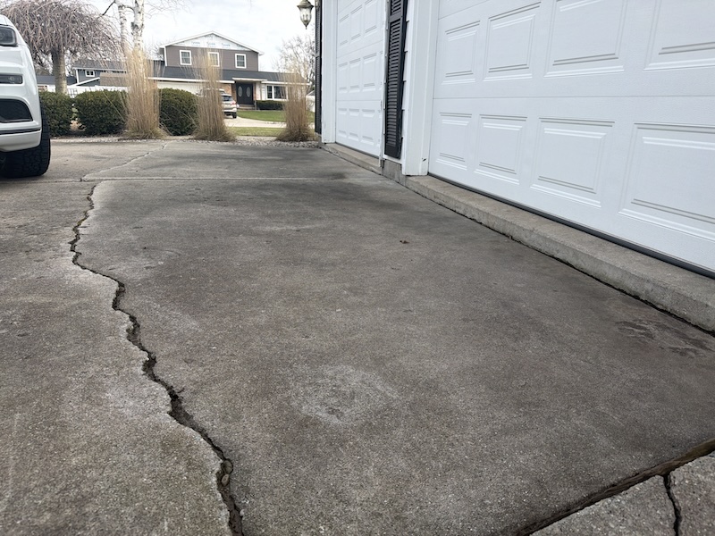 Driveway cracked sinking before Driveway cracked sinking before