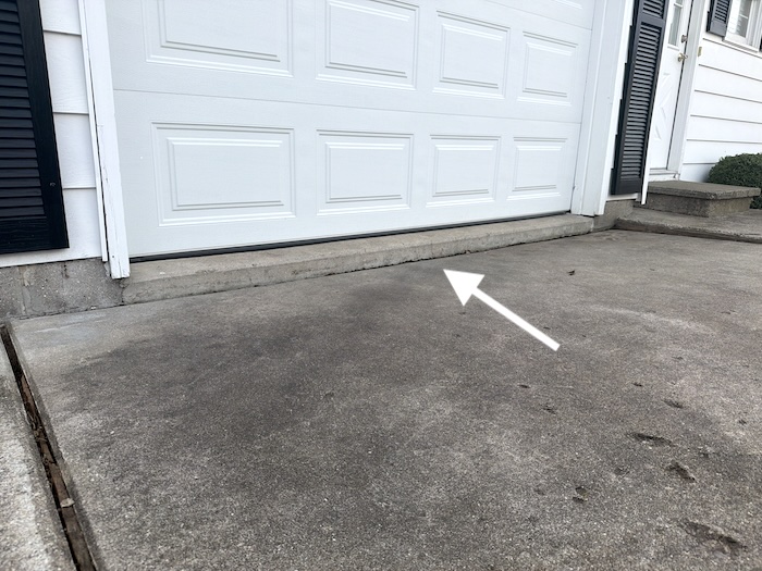 Driveway cracked sinking before Geneva IL