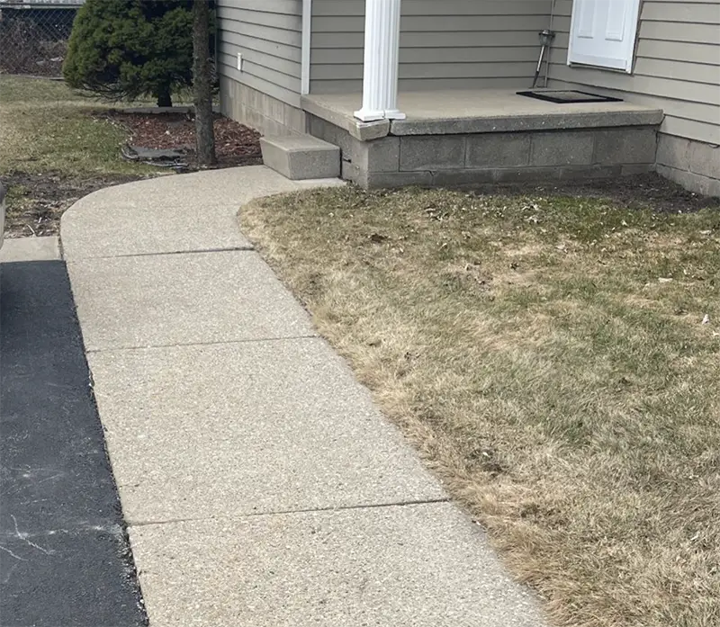 WALKWAY TRIP HAZARD REMOVAL & FRONT STEP STABILIZATION IN ELGIN, IL